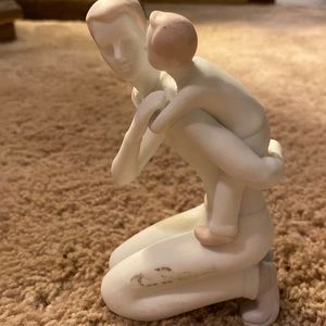 Father and son statue